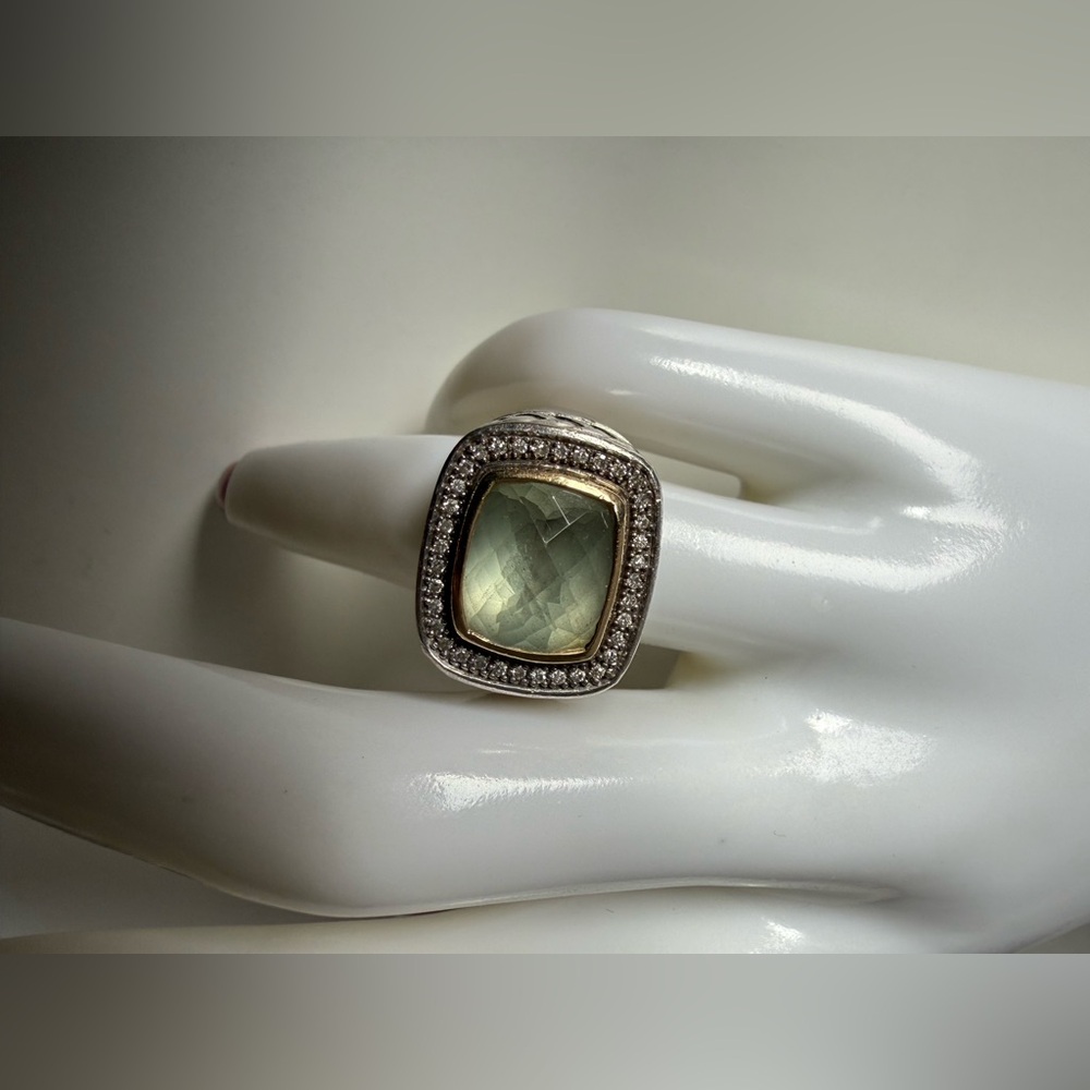 Stamped 925 and 14K Blue Topaz surrounded by Diamonds Ring